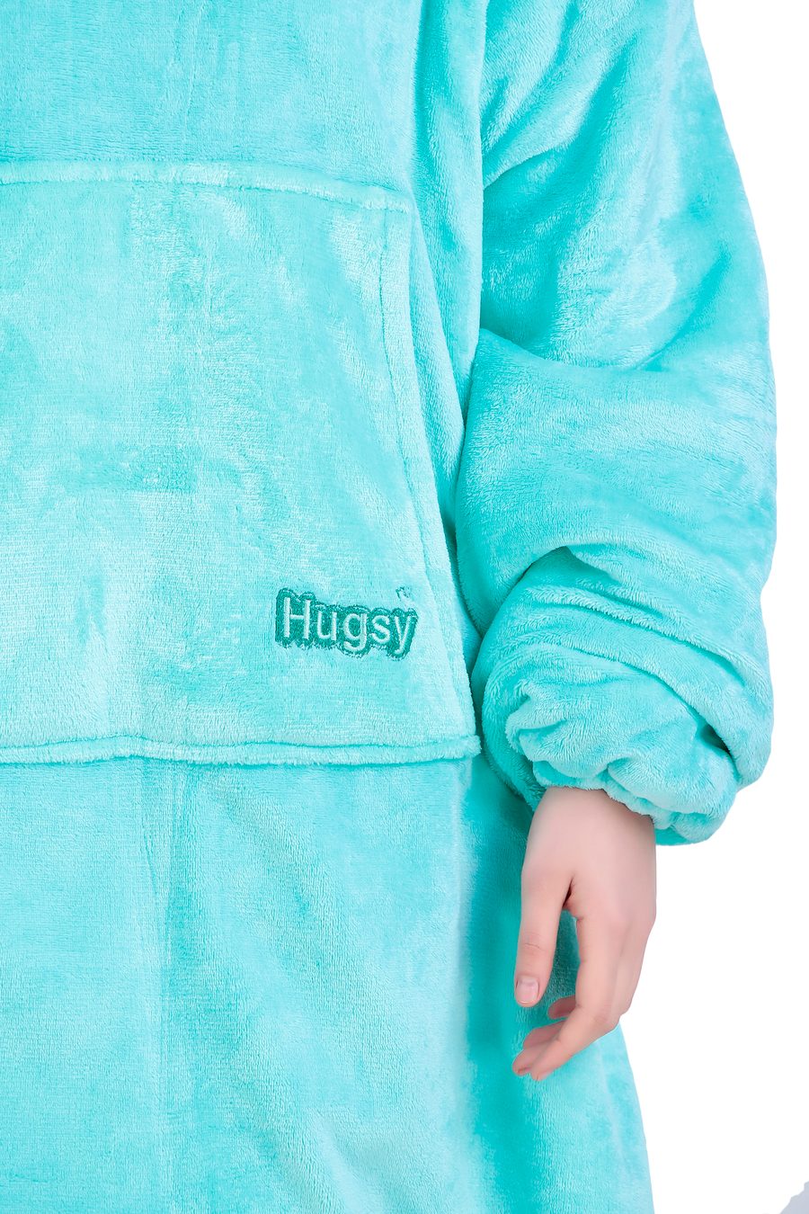 Close-up of the embroidered Hugsy logo on the front pocket