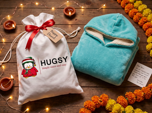 Hugsy gift bag with a single folded turquoise Hugsy for Diwali